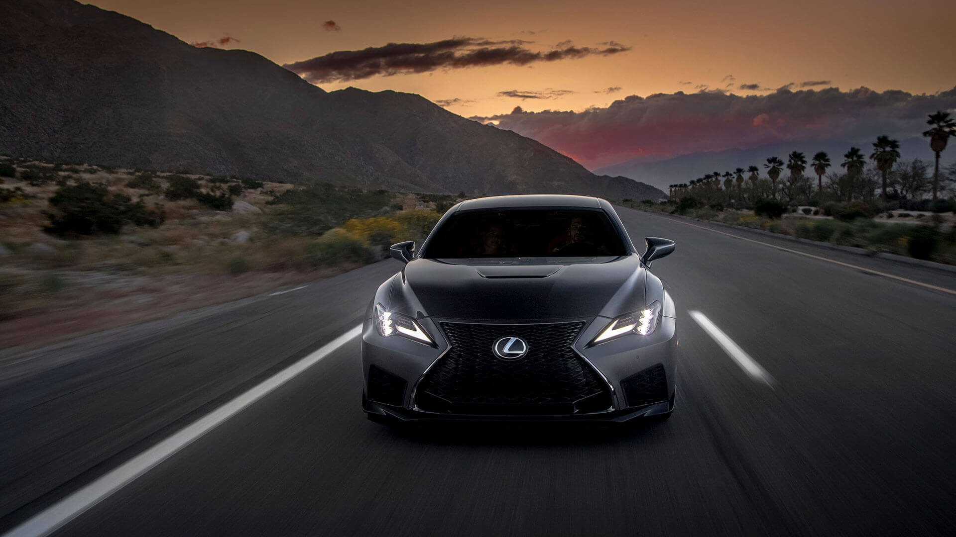 RC F being driven on a road at high speed.