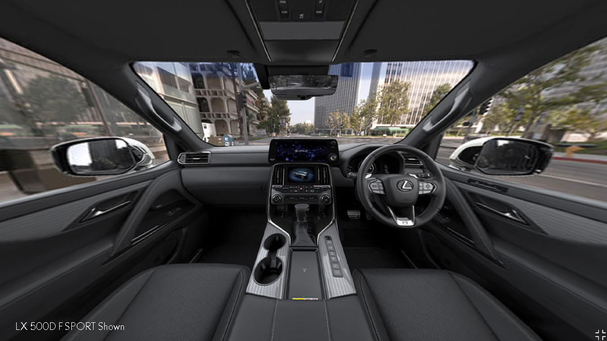  Interior view of a luxury Lexus showcasing a sleek dashboard and cutting-edge technology, providing a refined driving experience.